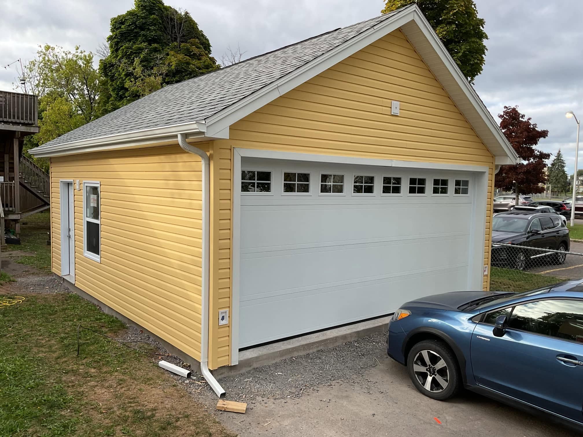 Finished garage addition by East Timber & Co